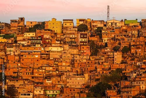 Fotografija Front view of a favela at sunset