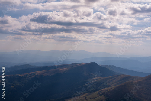 Impressive view from a Midzor mountain peak summit, the highest peak of Old mountain,2169 meters above sea level, and a view to surrounding peaks and highlands at summer Old Mountain in Serbia, Europe