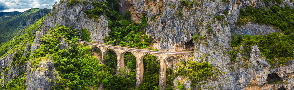 The old railway bridge of the Asopos river near village Iraklia at national park of Oiti, Greece