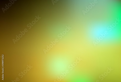 Dark Green, Yellow vector blurred pattern.