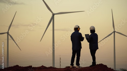Footage 4K: engineers and technician are talking about wind turbine