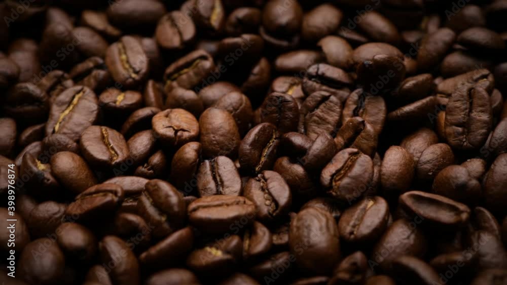fresh roasted coffee beans background (dolly shot) fresh roasted coffee beans background (dolly shot)