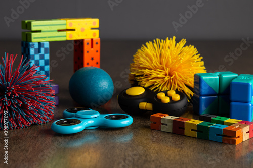 Childs fidget toys in different shapes, colors and styles.  photo