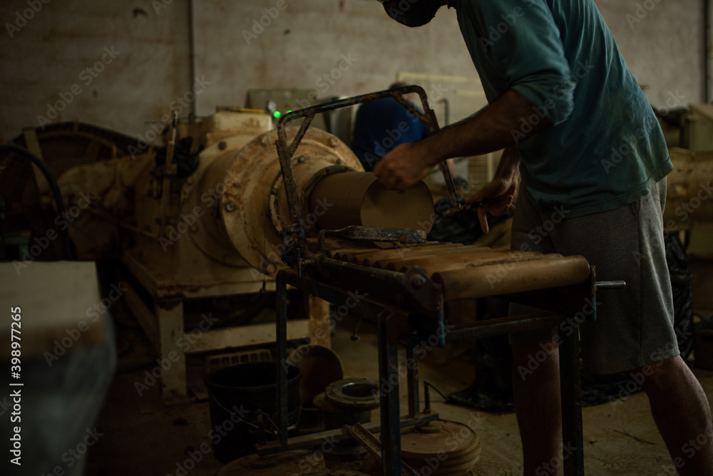 Handmade clay pot made by hand on manual lathe Handmade clay pot made by hand on manual lathe