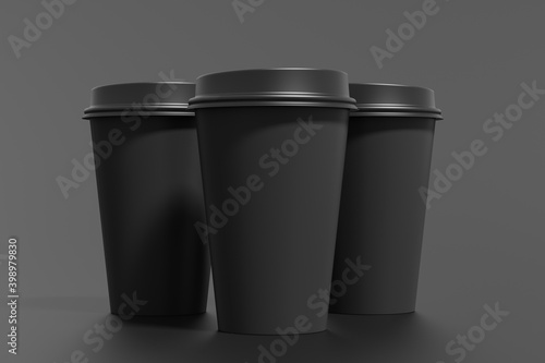 Three black take away coffee paper cups mock up with black lids on black background.