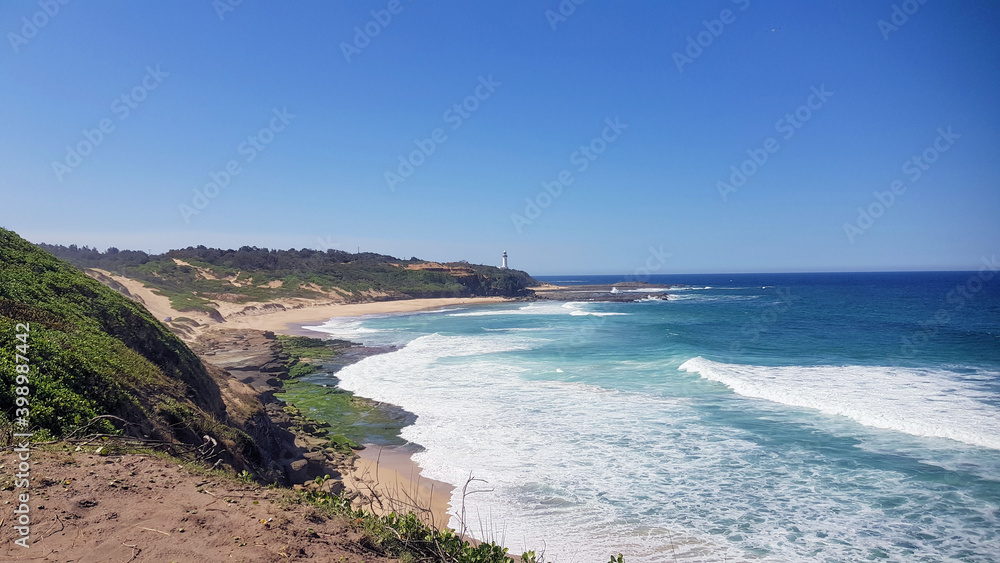 Norah Head and Beach with a Lighthouse Overlooking the Ocean, New South Wales Australia Norah Head and Beach with a Lighthouse Overlooking the Ocean, New South Wales Australia