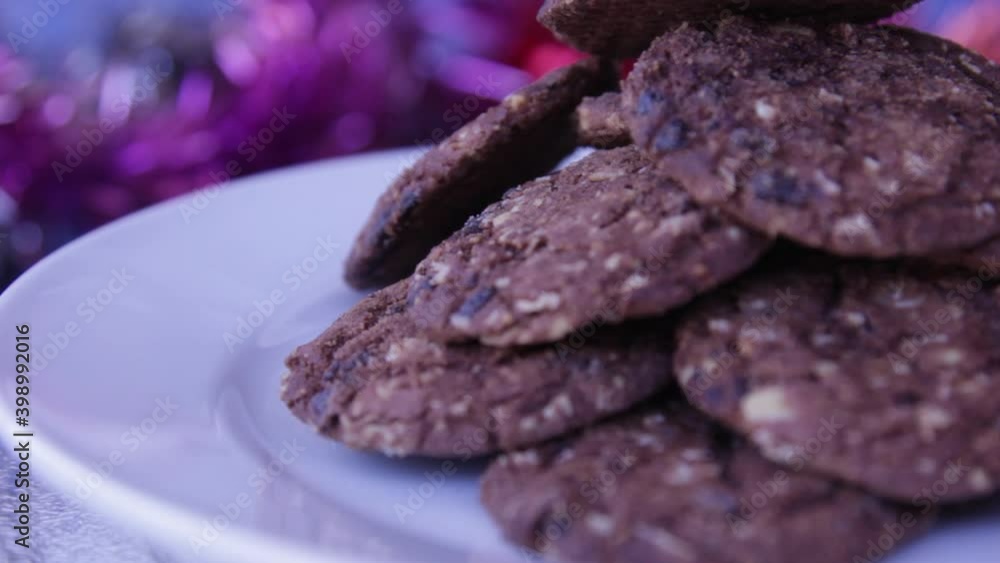 Brown chocolate Cookies for Christmas, Making handmade festive new year sweets and cookies for gift, Christmas and new year traditions, Christmas gingerbread cookies. Brown chocolate Cookies for Christmas, Making handmade festive new year sweets and cookies for gift, Christmas and new year traditions, Christmas gingerbread cookies.