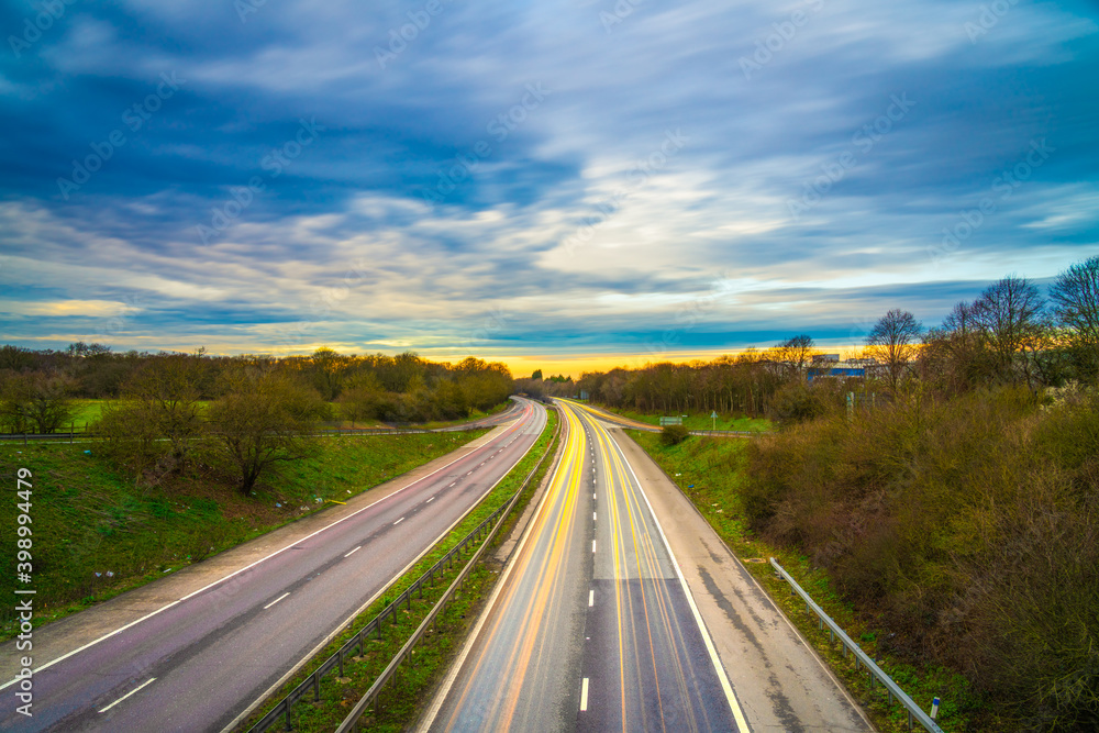 A1M motorway with cars light trails at sunset A1M motorway with cars light trails at sunset