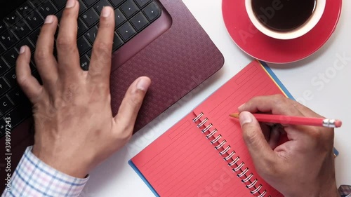 Close up of man hand typing on laptop. photo