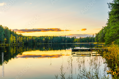 Fototapeta Naklejka Na Ścianę i Meble -  Sunset at the lake in autumn season