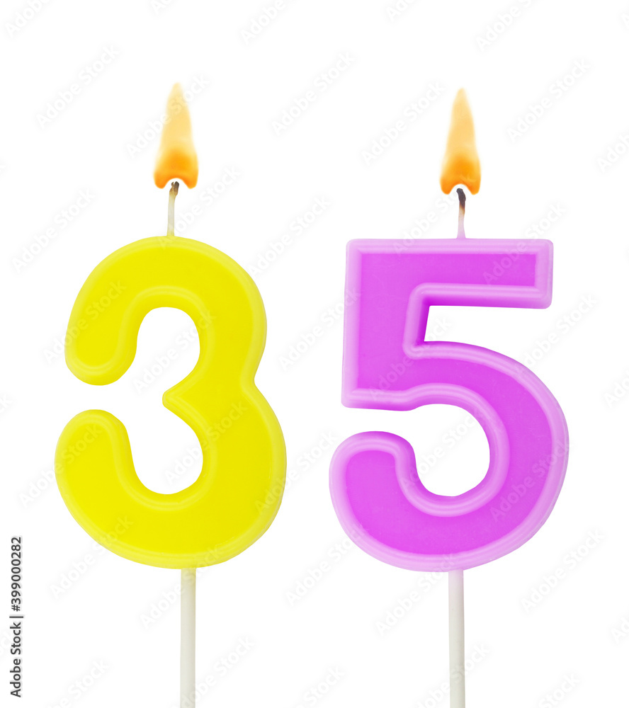 Burning birthday candles isolated on white background, number 35 Burning birthday candles isolated on white background, number 35