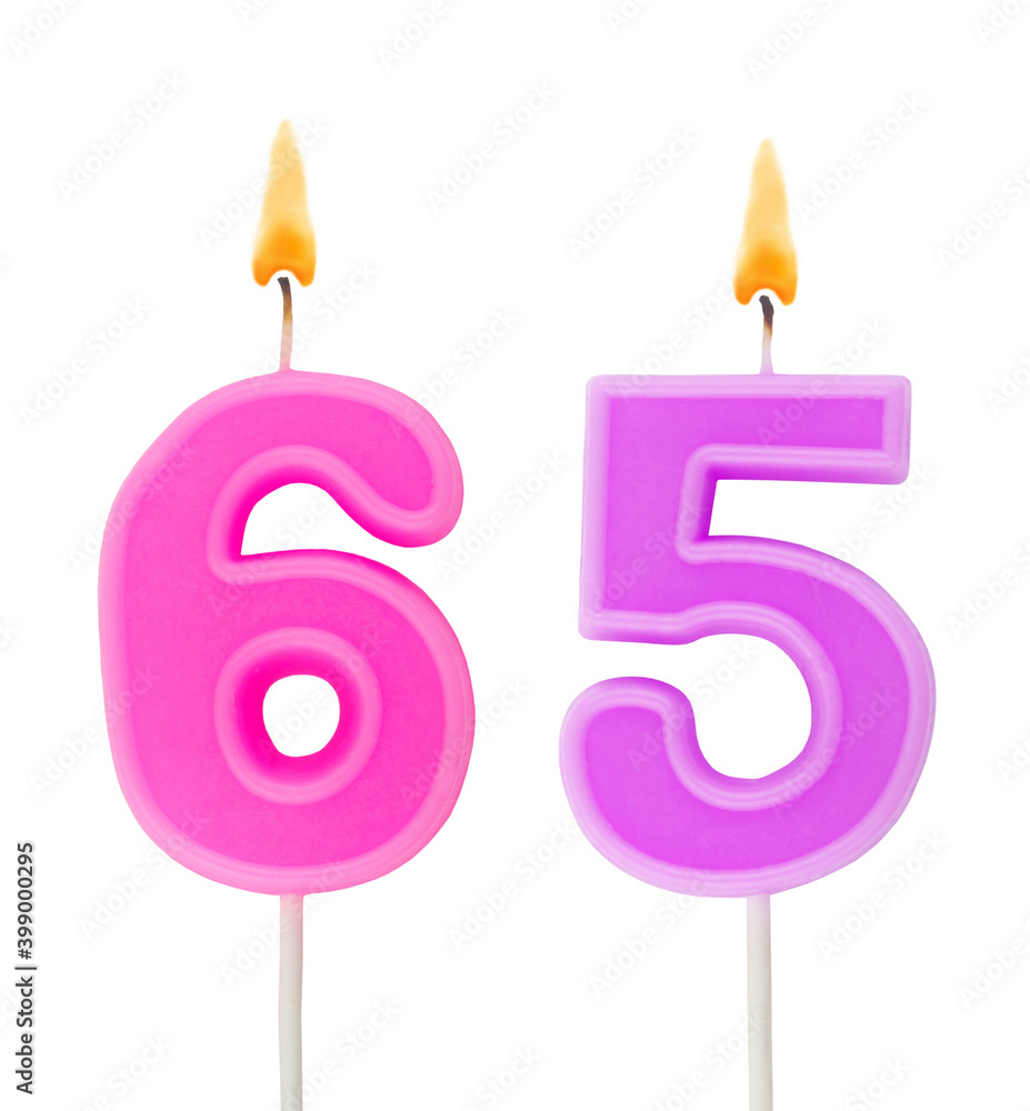 Burning birthday candles isolated on white background, number 65 Burning birthday candles isolated on white background, number 65