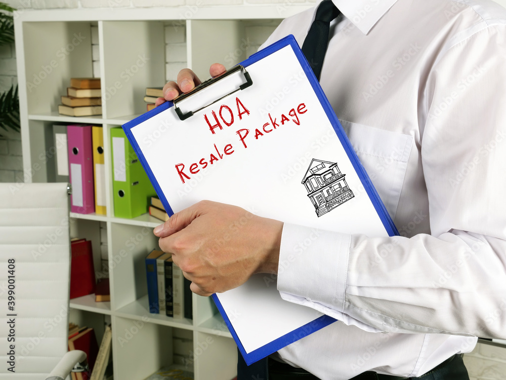 Financial concept about Homeowner Association HOA Resale Package with phrase on the piece of paper. Financial concept about Homeowner Association HOA Resale Package with phrase on the piece of paper.