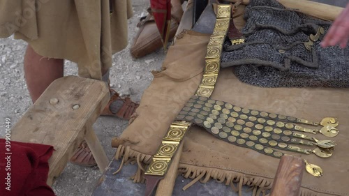 The ancient Romans Legionary's belt. Balteus was embellished with belt plates of cast brass with a shiny tin or silver finish stamped into them. Roman military Equipment photo