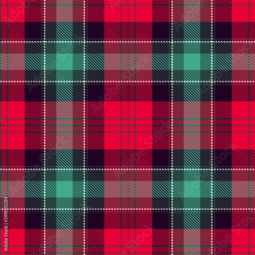 Christmas tartan seamless pattern. Trendy bright Christmas colors. Checkered scottish ornament in red, green and purple