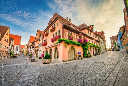 Traditional German architecture at Untere Schmiedgasse street in Rothenburg ob der Tauber. Germany 