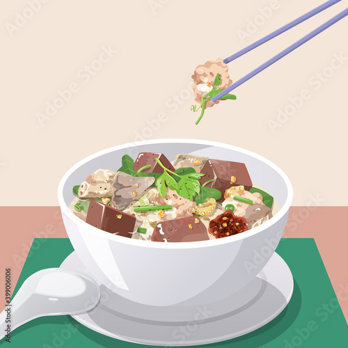 Congealed pork blood soup in a bowl, pick up pork with chopsticks.