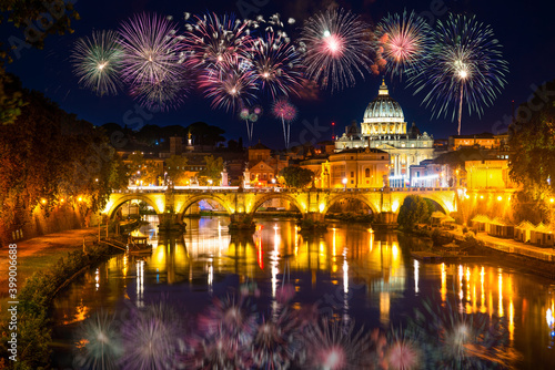 Fireworks display near Sant' Angelo Bridge and St. Peter's cathedral in Vatican City, Rome.Italy