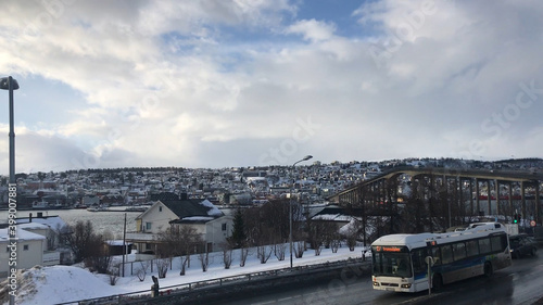 View of the street and road bridge in Tromso.