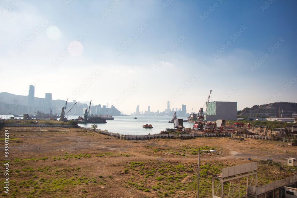 Kowloon, Hong Kong - 10.12.2020 : view of port near Kwun Tong Tsai Wan, Victoria Harbour seen from Yau Tong Kowloon, Hong Kong - 10.12.2020 : view of port near Kwun Tong Tsai Wan, Victoria Harbour seen from Yau Tong