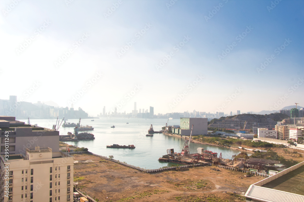 Kowloon, Hong Kong - 10.12.2020 : view of port near Kwun Tong Tsai Wan, Victoria Harbour seen from Yau Tong