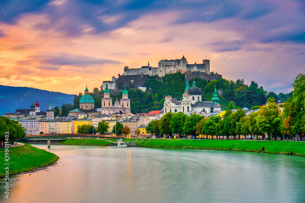 Salzburg skyline with Festung Hohensalzburg fortress at sunrise. Austria