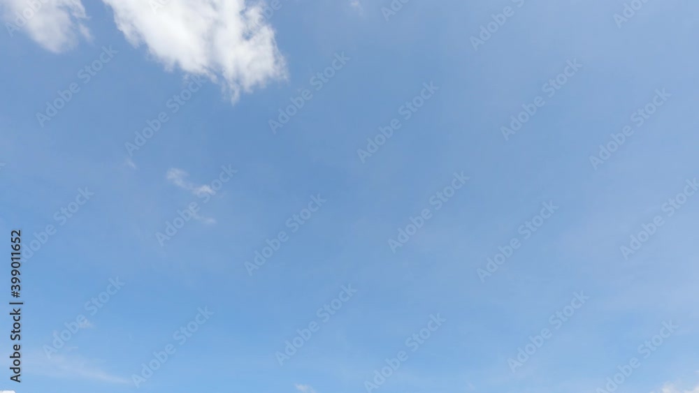 Fluffy puffy white cirrus or cirrostratus white cloud n cumulus cloudscape on beautiful sunny clear blue sky background in tropical summer or spring sunlight n sunray, 4k cinemagraphs b-roll TimeLapse Fluffy puffy white cirrus or cirrostratus white cloud n cumulus cloudscape on beautiful sunny clear blue sky background in tropical summer or spring sunlight n sunray, 4k cinemagraphs b-roll TimeLapse