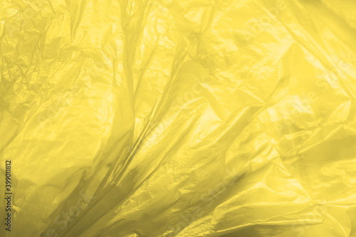 Illuminating yellow and gray plastic texture background