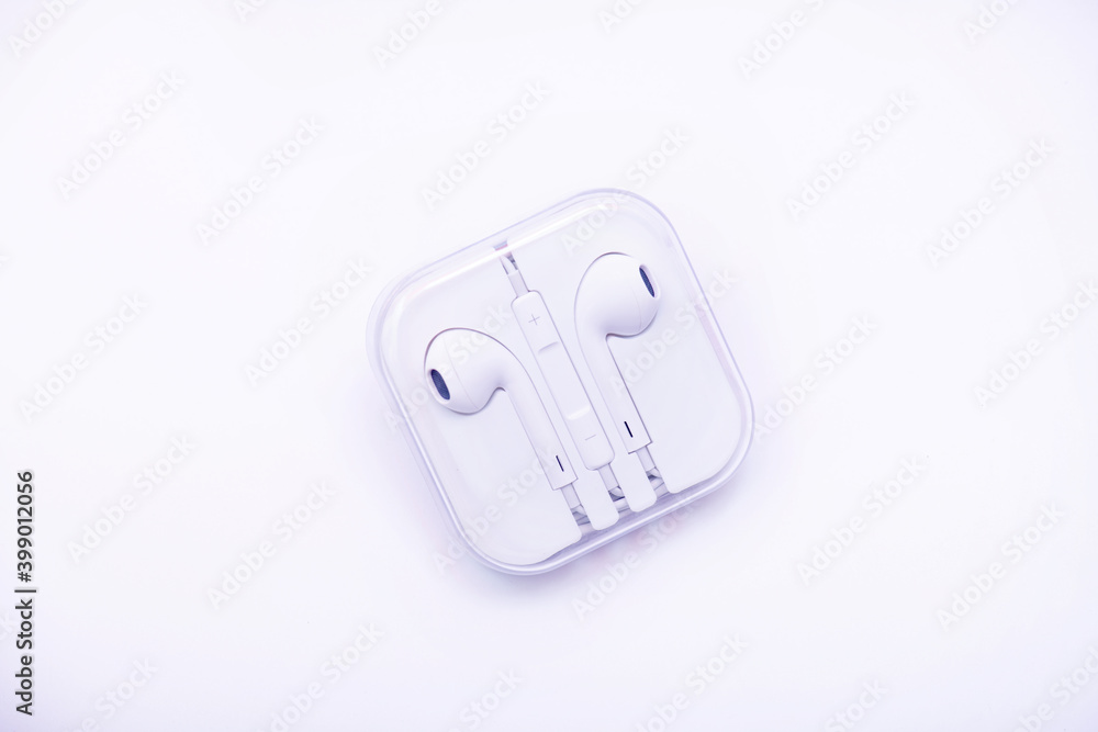 White wired earphones on white background White wired earphones on white background