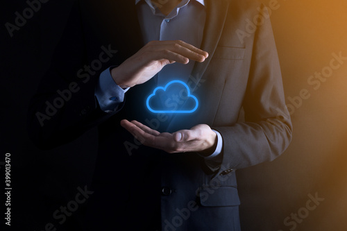 Businessman hand holding cloud computing concept in palm. Backup Storage Data Internet, networking and digital, Share global, and technology, concept.