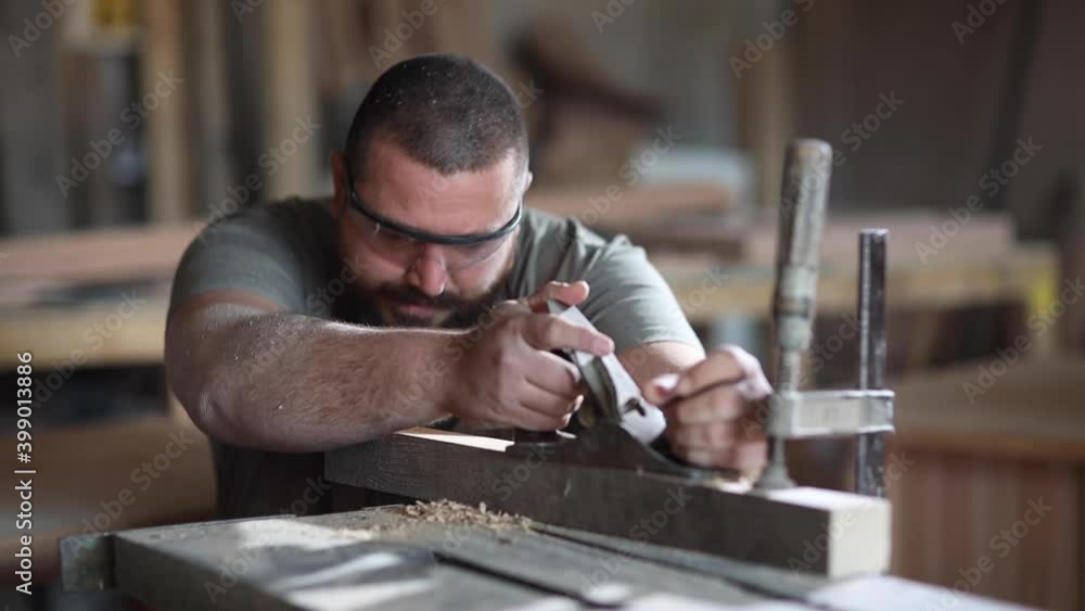 Young small business craftsperson in craft studio. Parts of a movie. You can make the big movie. Young small business craftsperson in craft studio. Parts of a movie. You can make the big movie.