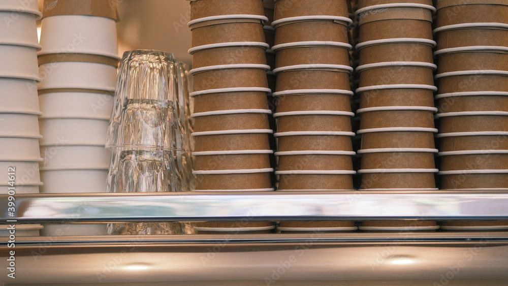 stacked coffee cups above the coffee machine at the cafe stacked coffee cups above the coffee machine at the cafe