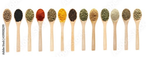 Set spices, coriander, black cumin, oregano, paprika powder, basil dried, turmeric, chili pepper flakes, celery, ginger, parsley, peppercorn, colorful pepper, rosemary isolated on white, top view   