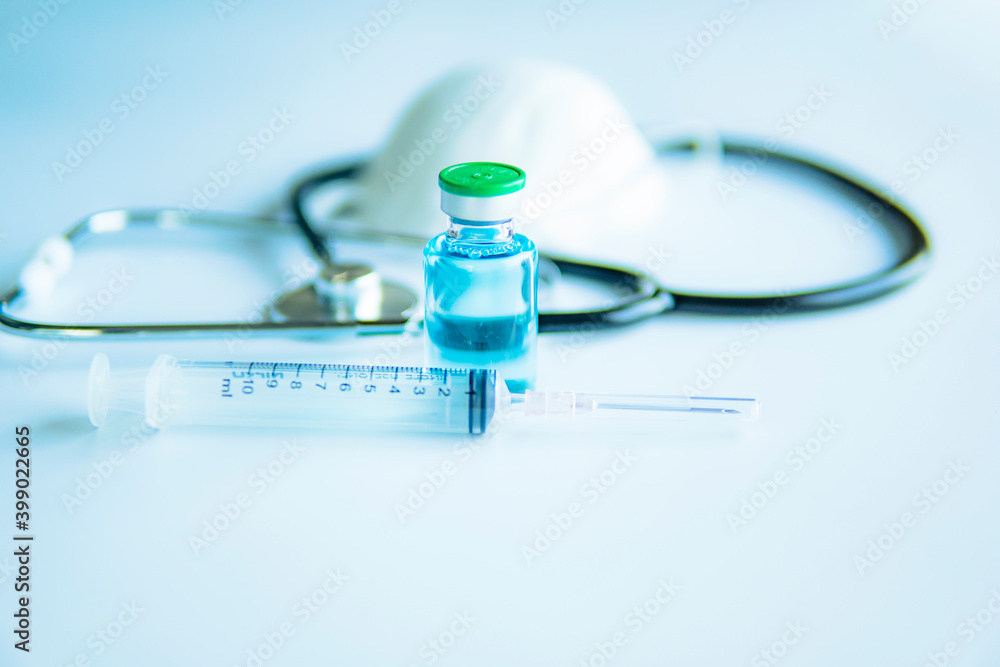 Vaccine  Syringe and Medical stethoscope on medical space  vaccine corona virus concept