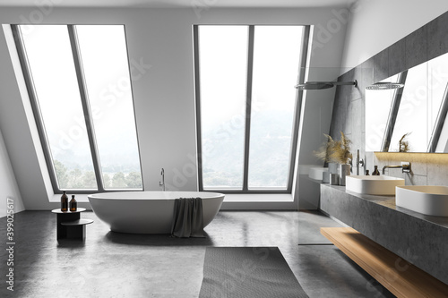 Attic white bathroom interior with tub and sink  side view