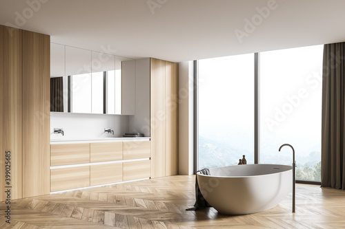 Wooden bathroom corner with tub and sink