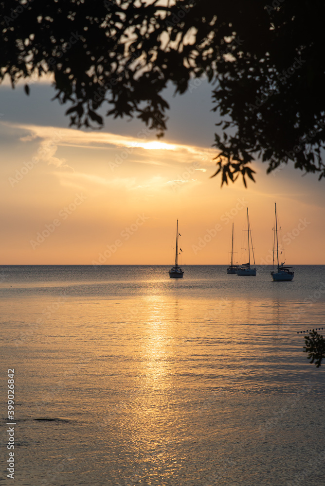 sunset over sea bay with yachts on background sunset over sea bay with yachts on background