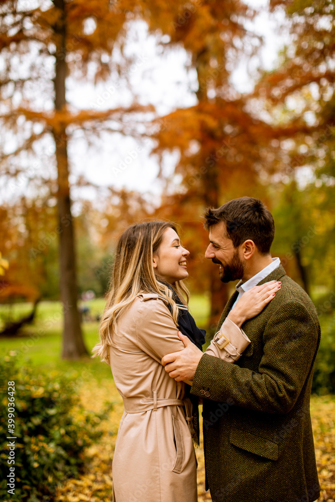 Young couple in the autumn park Young couple in the autumn park
