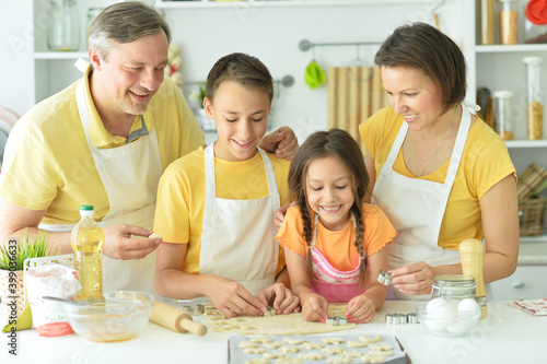 Happy family baking together in the kitchen