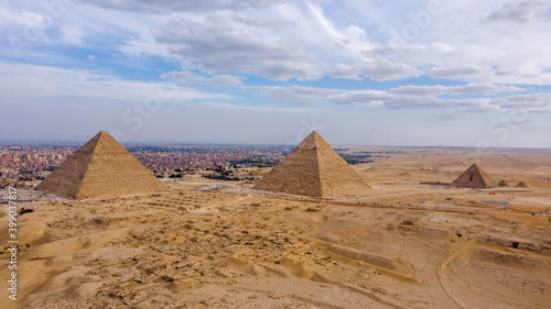 Aerial landscape view of Giza pyramids in Egypt shot by drone