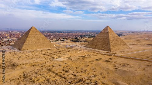 Landscape view of Pyramid of Khafre and Pyramid of Khufu, Giza pyramids landscape. historical egypt pyramids shot by drone