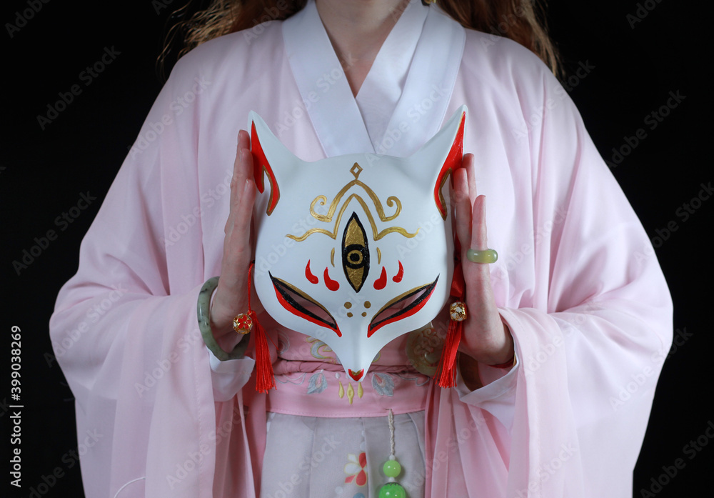 Woman wearing kimono and a fox mask. Japanese traditional concept. Stock  Photo | Adobe Stock