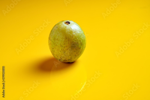 Guava or Psidium guajava Linn , fruits on yellow background.