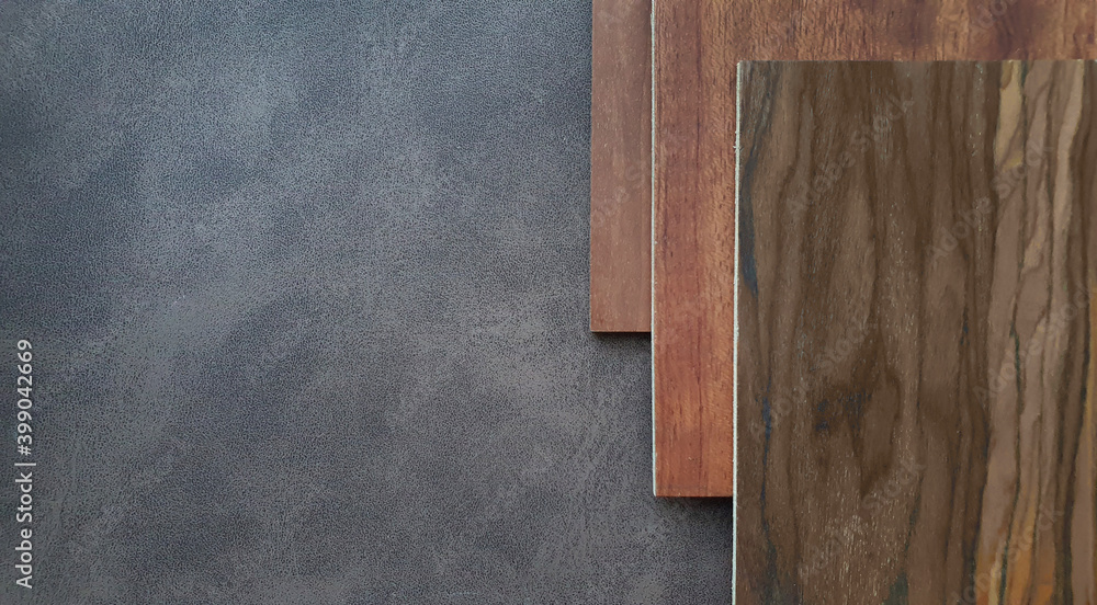 combination of interior material between set of red brown tone wooden veneer containing hickory ,oak ,cherry wood texture placed on dark brown leather fabric (focused on leather texture). - obrazy, fototapety, plakaty 