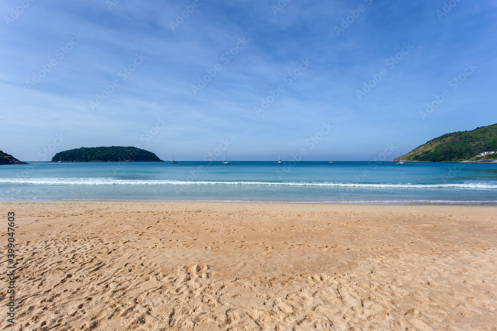 Beautiful nature of the Andaman Sea and white sand beach in the morning at Patong Beach, Phuket Island, Thailand. Nature and travel concept