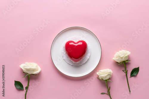 Creative composition for Valentines Day with red heart cake and white flowers. Romantic love concept. pink background. flat lay. space for text © Mila Naumova