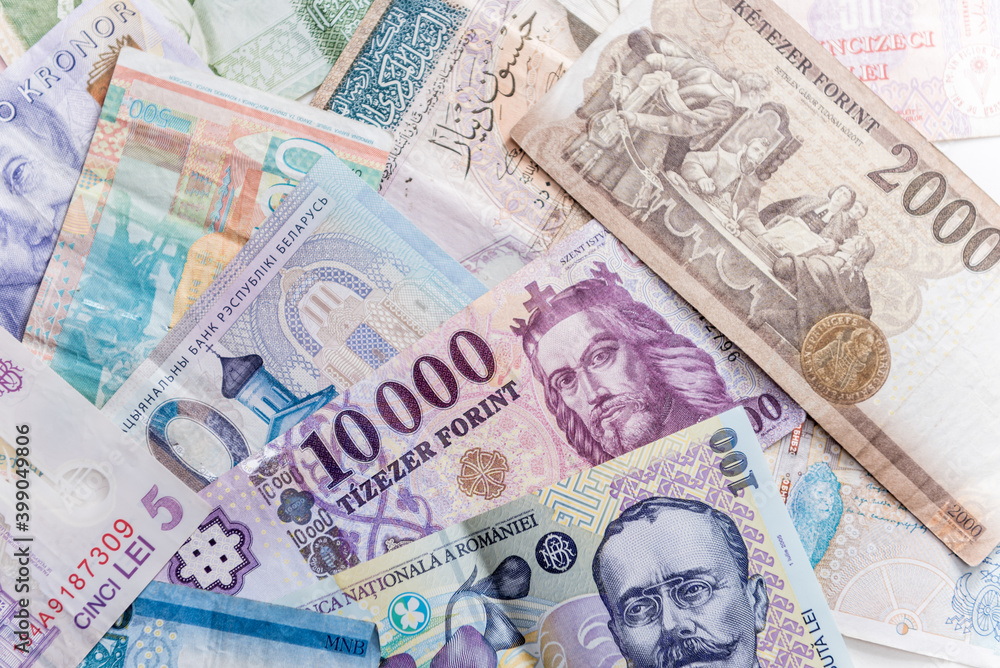 Obraz premium Paper money background of the different countries