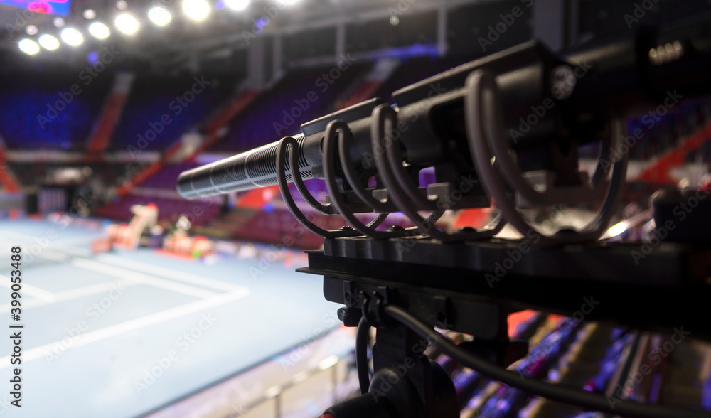 Fototapeta premium Detail with a professional sport microphone on tennis court.