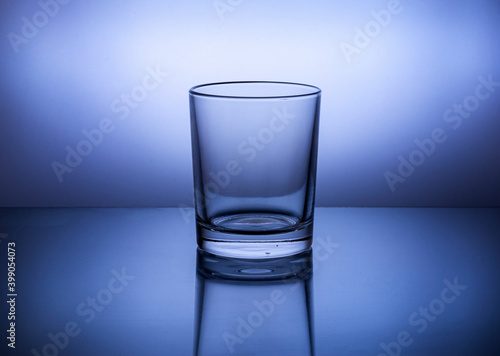 A glass on a blue background