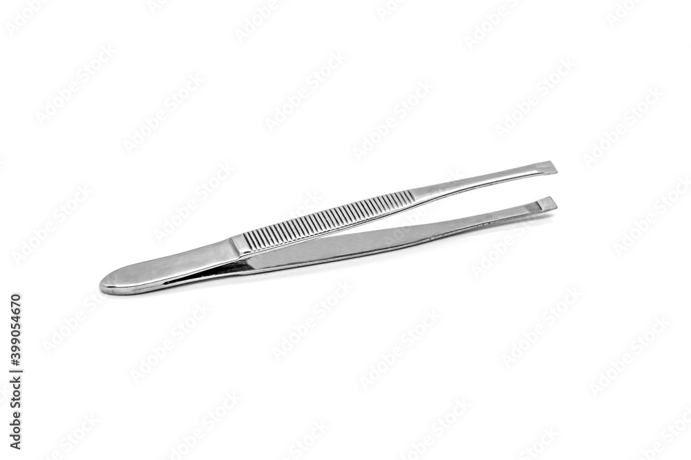 Metal tweezers for eyebrow correction and removal of small hairs isolated on white background. Cosmetology tools, personal care, hair removal. Metal tweezers for eyebrow correction and removal of small hairs isolated on white background. Cosmetology tools, personal care, hair removal.